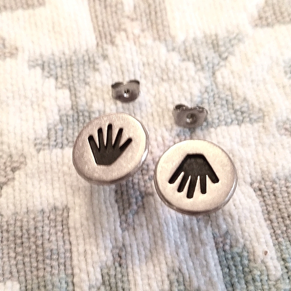 Artisan petroglyph handprint studs